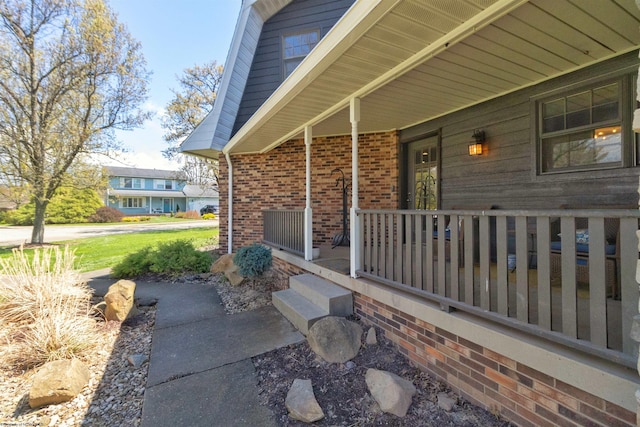 view of patio featuring a porch