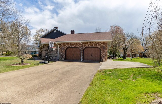 view of front facade with a chimney, concrete driveway, a shingled roof, an attached garage, and a front yard