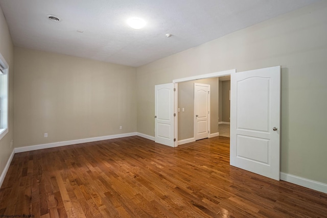 306 Villa View Dr, Morgantown, WV 26505 - unfurnished bedroom with wood finished floors, visible vents, and baseboards