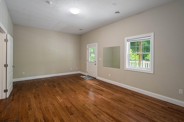 306 Villa View Dr, Morgantown, WV 26505 - spare room with baseboards, visible vents, and dark wood-style floors
