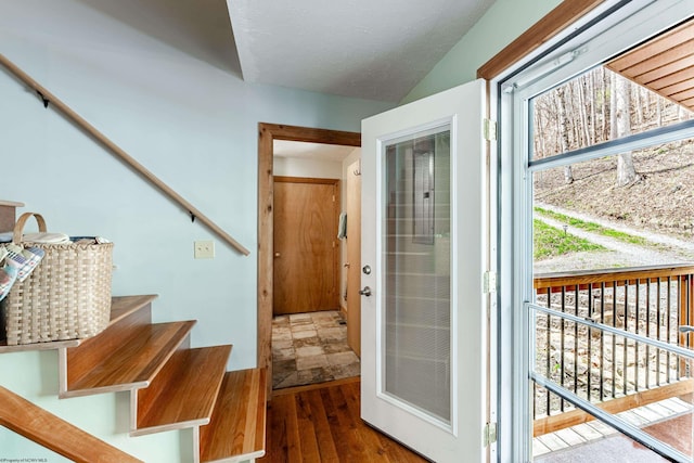 interior space with stairs and hardwood / wood-style flooring