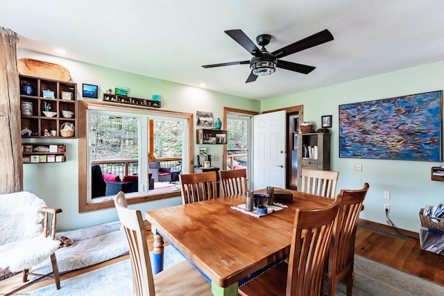 dining area with ceiling fan, baseboards, wood finished floors, and recessed lighting