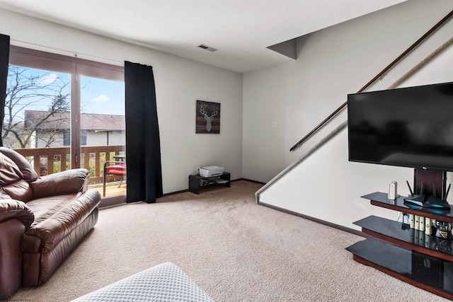 1224 Van Voorhis Rd, Morgantown, WV 26505 - living area featuring visible vents, carpet flooring, and baseboards