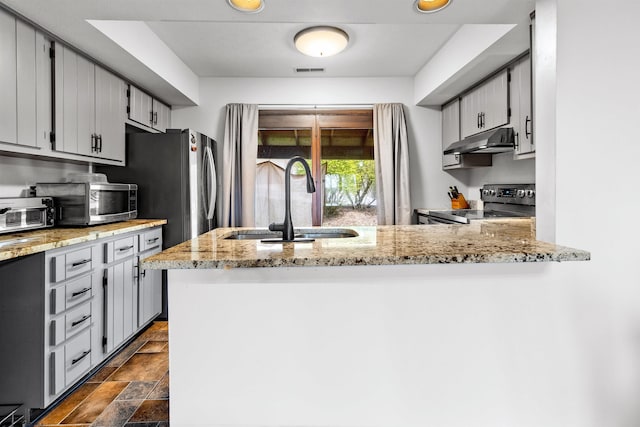 1224 Van Voorhis Rd, Morgantown, WV 26505 - kitchen featuring a peninsula, a sink, visible vents, stainless steel range with electric stovetop, and under cabinet range hood