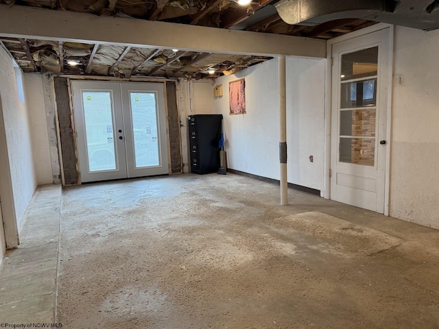 below grade area featuring french doors