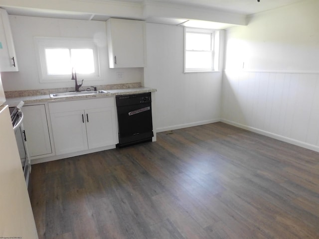 kitchen with light countertops, a sink, dark wood-type flooring, black dishwasher, and white cabinetry
