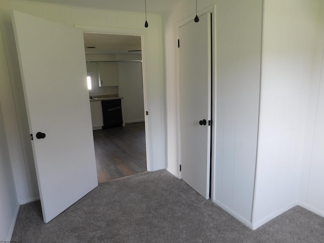 corridor with carpet floors