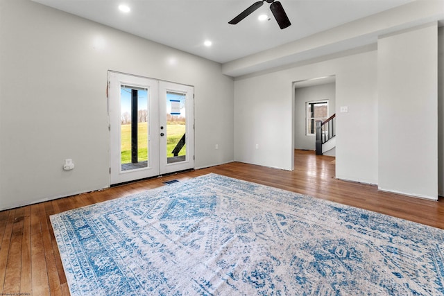 spare room featuring french doors, visible vents, a wealth of natural light, and a ceiling fan