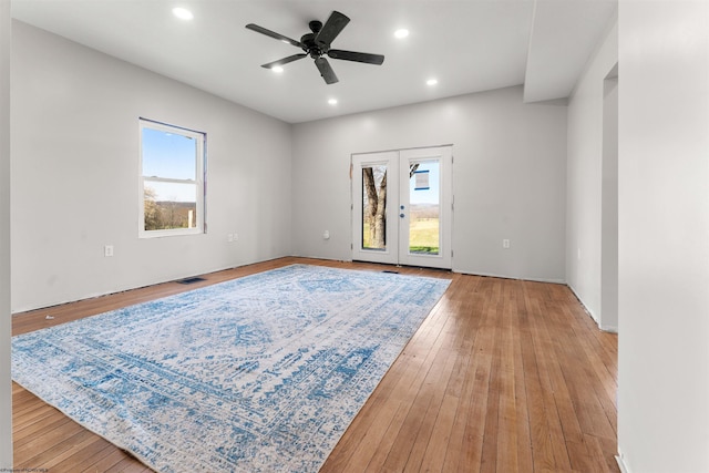 spare room featuring recessed lighting, light wood-style floors, visible vents, and ceiling fan