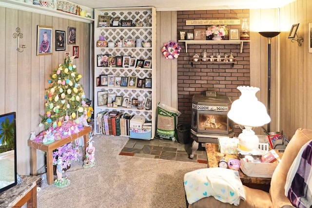 3935 Cranesville Rd, Terra Alta, WV 26764 - living area with wood walls, stone finish floor, and a wood stove
