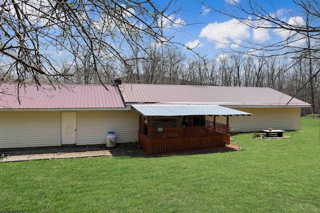 3935 Cranesville Rd, Terra Alta, WV 26764 - rear view of property with a lawn and metal roof