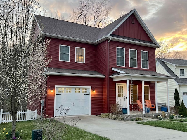 1029 Olivia Way, Morgantown, WV 26508 - craftsman-style house featuring driveway, a porch, fence, an attached garage, and board and batten siding