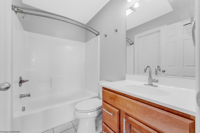 full bathroom featuring toilet, vanity, tile patterned floors, and shower / tub combination