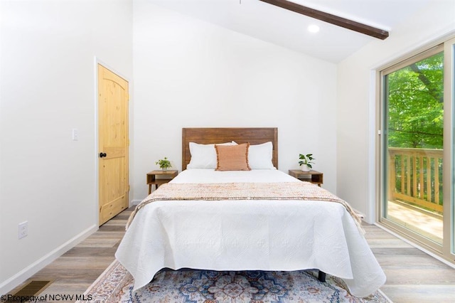 bedroom featuring light wood-style floors, vaulted ceiling with beams, access to exterior, visible vents, and baseboards