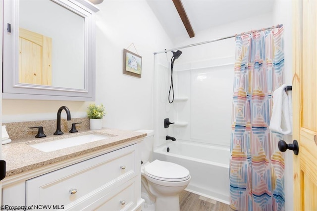 full bathroom with beamed ceiling, vanity, shower / bath combination with curtain, toilet, and wood finished floors