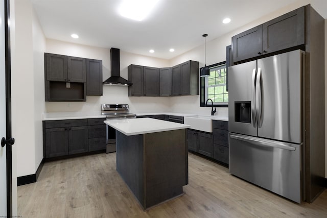69 Hall Valley Ct, Bridgeport, WV 26330 - kitchen featuring a sink, light wood-style floors, a kitchen island, wall chimney range hood, and appliances with stainless steel finishes