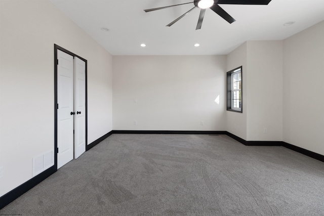 unfurnished room featuring recessed lighting, carpet, baseboards, visible vents, and a ceiling fan