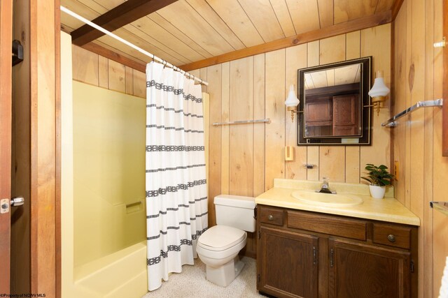 full bath with shower / bath combo, wooden ceiling, wooden walls, toilet, and vanity