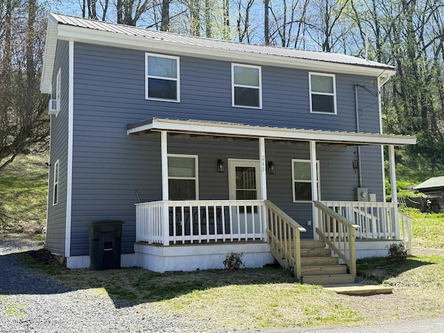 view of front of home with metal roof and covered porch