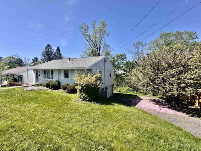 1223 Katherine St, Fairmont, WV 26554 - view of front of property featuring a garage, a front yard, and driveway
