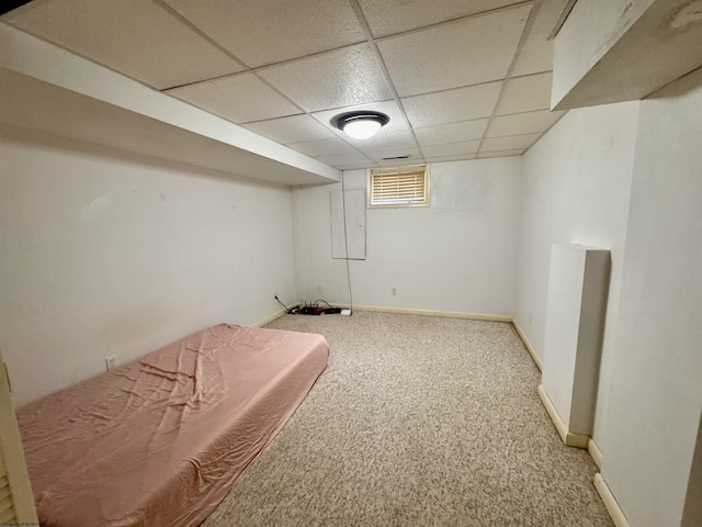 1223 Katherine St, Fairmont, WV 26554 - below grade area featuring a paneled ceiling, carpet flooring, and baseboards