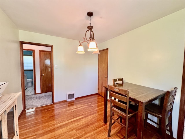 1223 Katherine St, Fairmont, WV 26554 - dining area with visible vents, baseboards, and light wood-type flooring