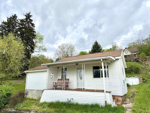 125 E Long St, Grafton, WV 26354 - view of front facade with a porch and a shingled roof