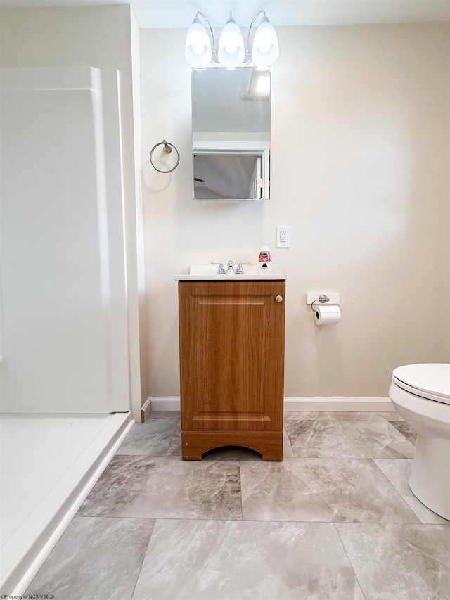 125 E Long St, Grafton, WV 26354 - full bath featuring baseboards, walk in shower, toilet, vanity, and marble finish floor