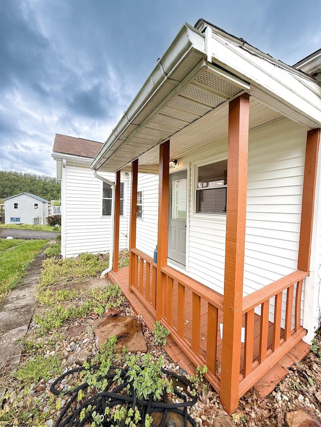 125 E Long St, Grafton, WV 26354 - exterior space featuring a shingled roof and covered porch