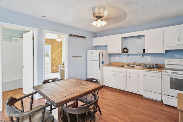 5570 Appalachian Hwy, Davis, WV 26260 - kitchen with open shelves, custom range hood, a sink, ceiling fan, and white appliances