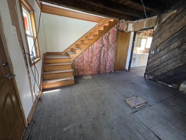 interior space with wood-type flooring and stairs