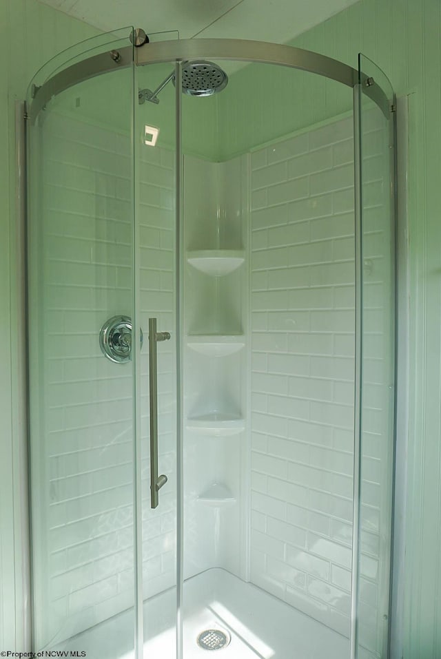 bathroom with a stall shower