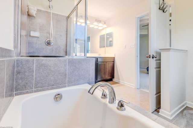 3005 Sun Vw, Morgantown, WV 26505 - bathroom featuring baseboards, a bath, and vanity