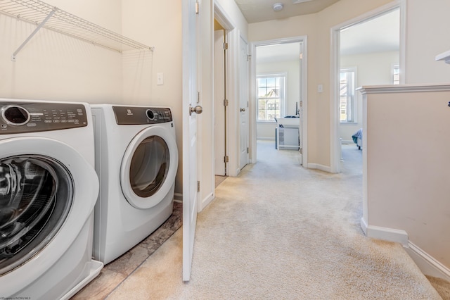 3005 Sun Vw, Morgantown, WV 26505 - clothes washing area with washing machine and dryer, baseboards, and light carpet