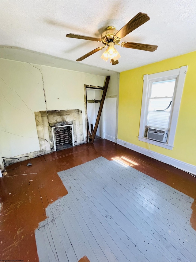 520 Mount Vernon Ave, Fairmont, WV 26554 - unfurnished living room with ceiling fan, a fireplace, cooling unit, hardwood / wood-style floors, and baseboards