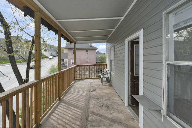 balcony featuring a residential view
