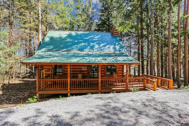 79 Pines Dr, Davis, WV 26260 - exterior space featuring a chimney, metal roof, and a forest view