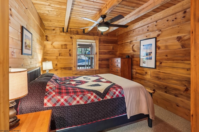 79 Pines Dr, Davis, WV 26260 - carpeted bedroom with wood ceiling, ceiling fan, beamed ceiling, and wood walls