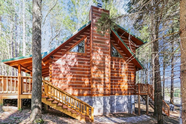 79 Pines Dr, Davis, WV 26260 - view of side of property with a deck, a chimney, and stairs