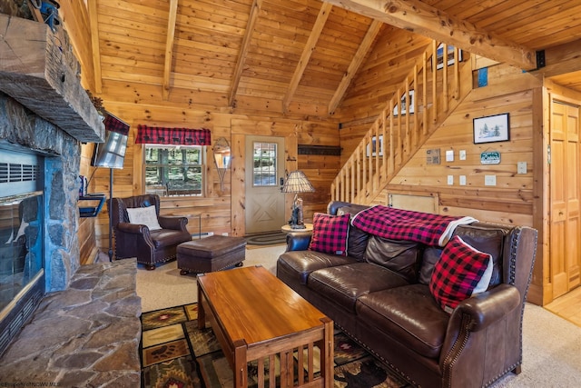 79 Pines Dr, Davis, WV 26260 - carpeted living area featuring a stone fireplace, wood walls, and wooden ceiling