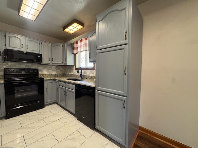 143 Sunday Dr, Fairmont, WV 26554 - kitchen with a sink, gray cabinets, marble finish floor, tasteful backsplash, and black appliances