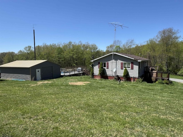 143 Sunday Dr, Fairmont, WV 26554 - view of yard featuring an outbuilding and a wooden deck