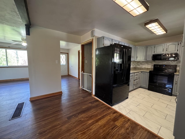 143 Sunday Dr, Fairmont, WV 26554 - kitchen with visible vents, baseboards, a ceiling fan, black appliances, and gray cabinetry