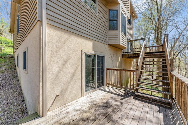 deck featuring stairway