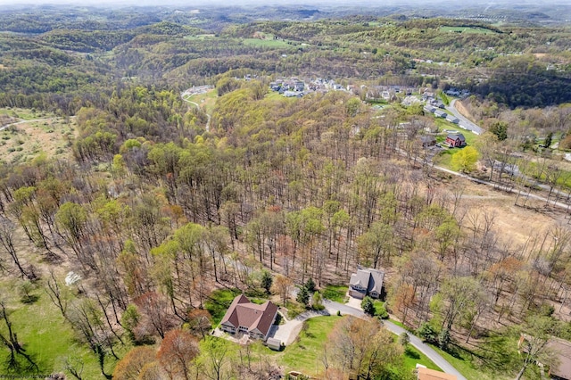 aerial view featuring a forest view