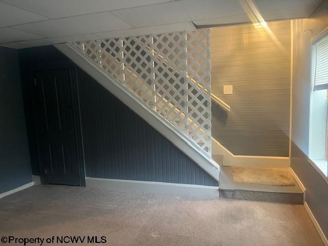 510 6th St, Fairmont, WV 26554 - stairs featuring baseboards and carpet flooring