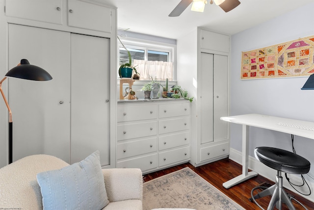 office space featuring dark wood finished floors and ceiling fan