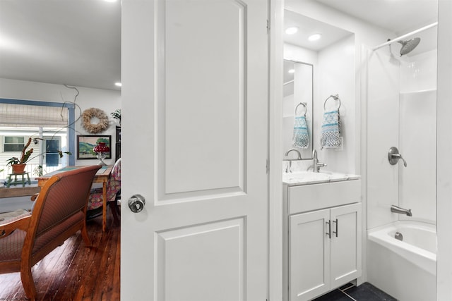 ensuite bathroom featuring vanity, recessed lighting, ensuite bath, and bathtub / shower combination