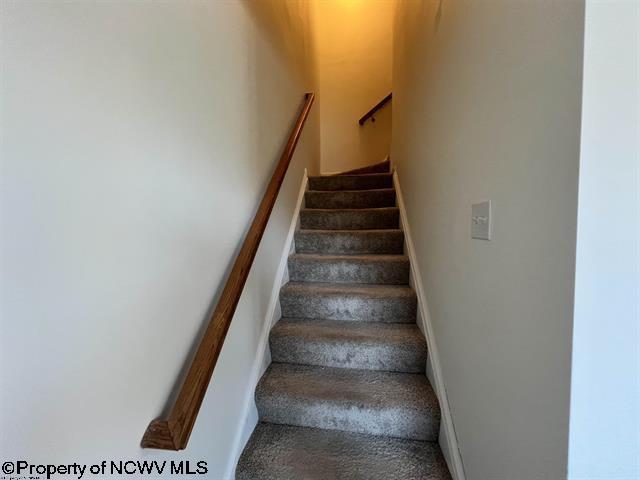 stairway with baseboards