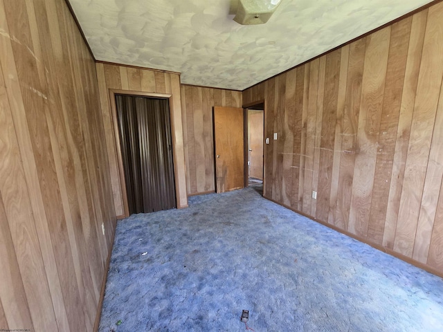 130 Hunsaker St, Fairmont, WV 26554 - empty room featuring wooden walls and carpet flooring